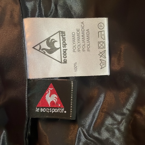 Vintage Le Coq Sportif black windbreaker with attached hidden hood Pristine - Picture 5 of 9